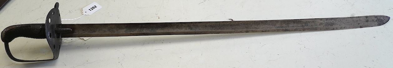 A 1796 pattern heavy cavalry trooper's sword with proof marks, blade 88cm. Condition - hilt heavily pitted, blade tip slightly modified, some worm damage to grip, etc.